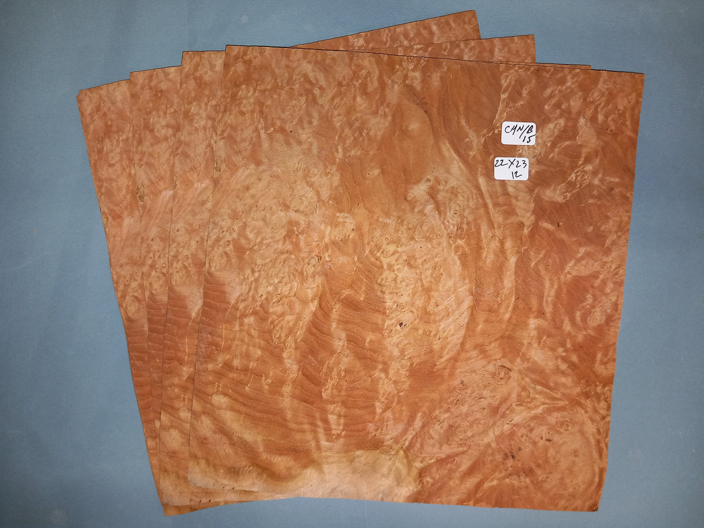 4 CONSECUTIVE SHEETS OF CHESTNUT BURR VENEER 22 X 23 CM