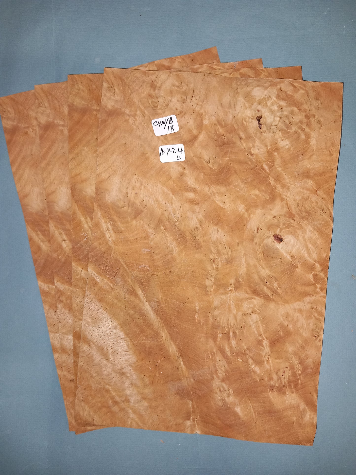 4 CONSECUTIVE SHEETS OF CHESTNUT BURR VENEER 16 X 24 CM