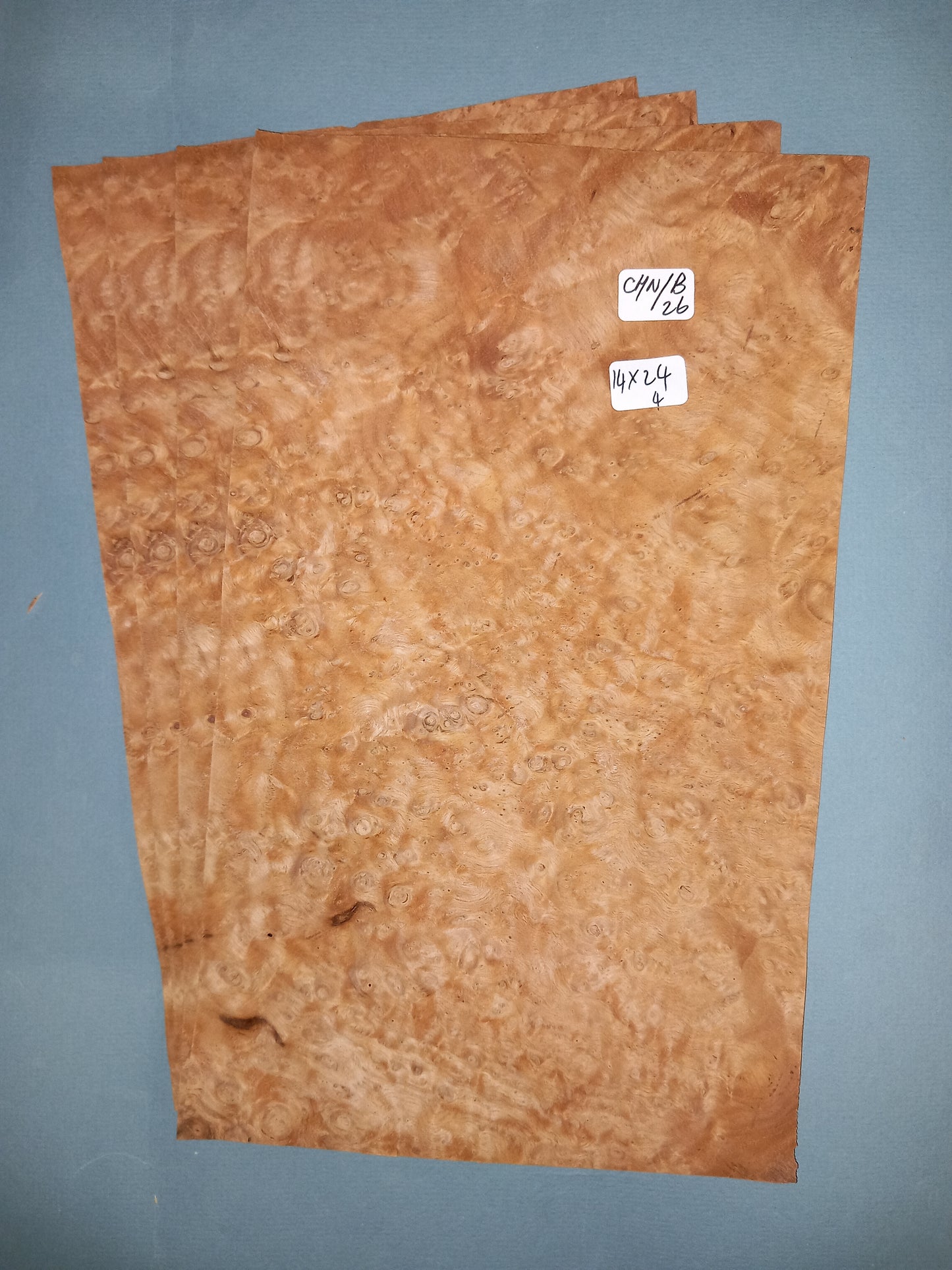 4 CONSECUTIVE SHEETS OF CHESTNUT BURR VENEER 14 X 24 CM