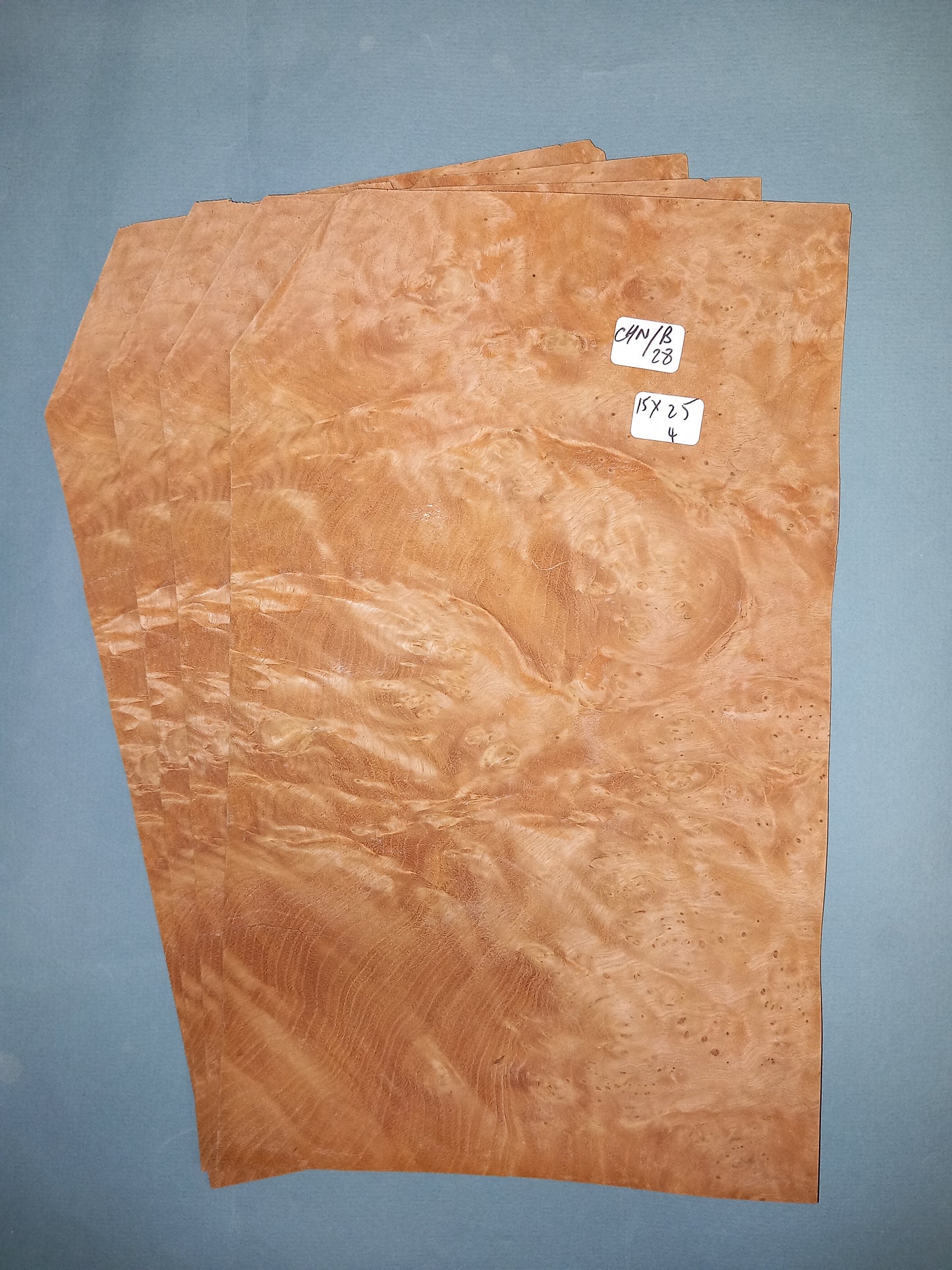 4 CONSECUTIVE SHEETS OF CHESTNUT BURR VENEER 15 X 25 CM