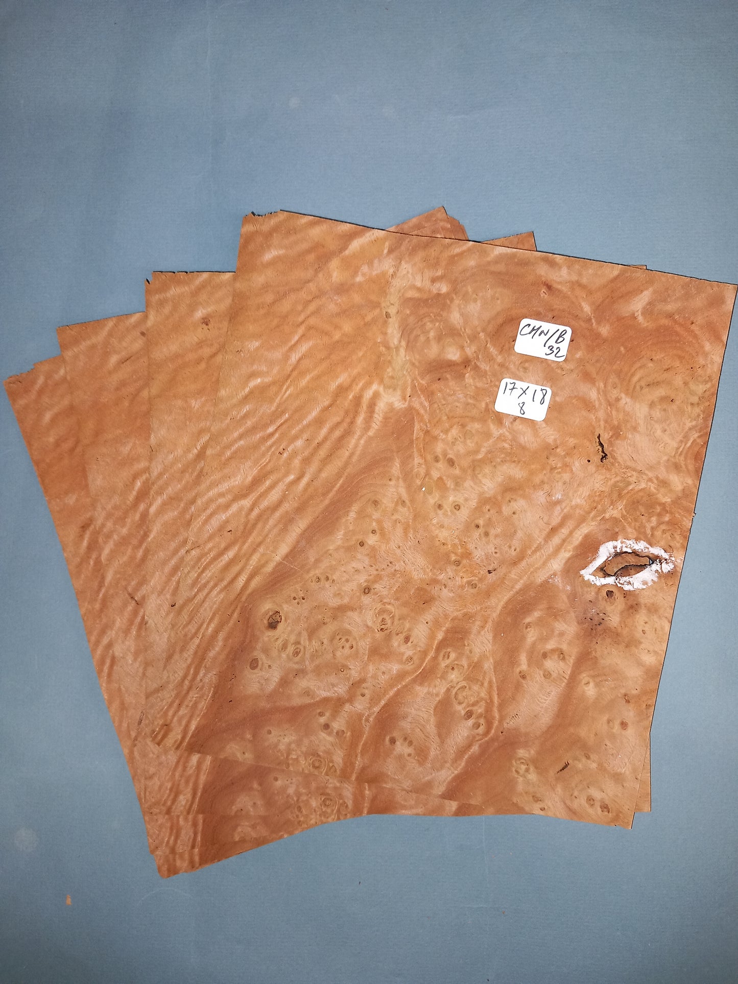 4 CONSECUTIVE SHEETS OF CHESTNUT BURR VENEER 17 X 18 CM