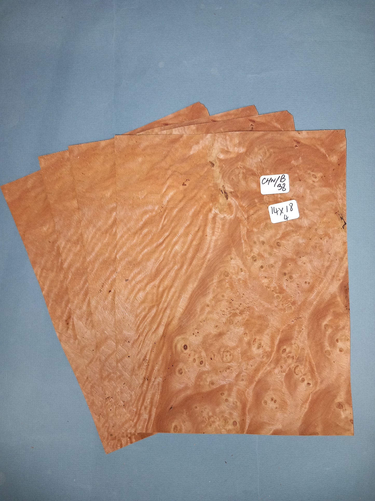 4 CONSECUTIVE SHEETS OF CHESTNUT BURR VENEER 14 X 18 CM