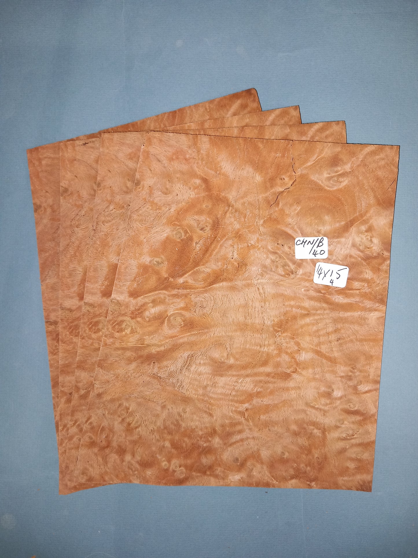 4 CONSECUTIVE SHEETS OF CHESTNUT BURR VENEER 14 X 15 CM