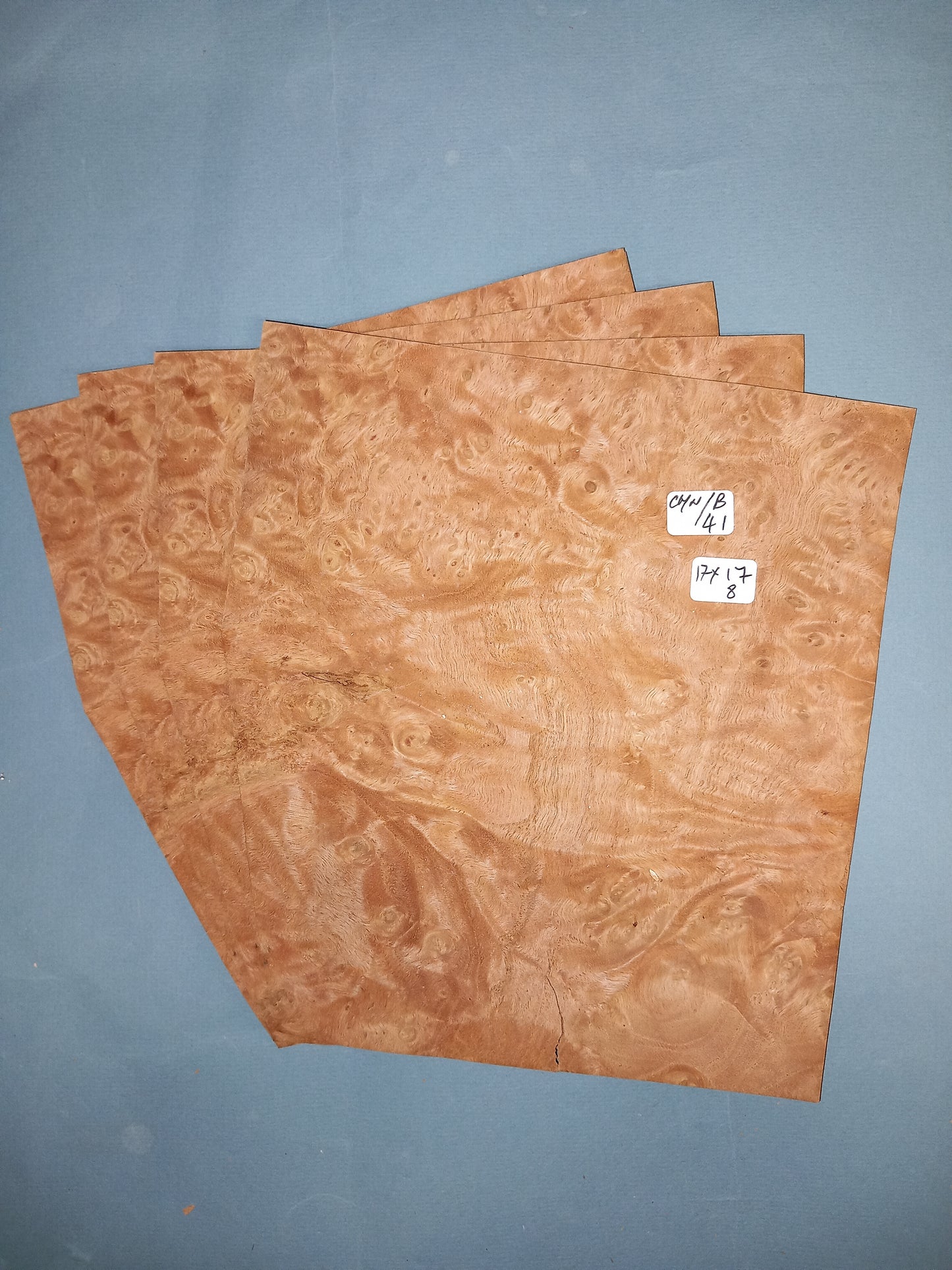 4 CONSECUTIVE SHEETS OF CHESTNUT BURR VENEER 17 X 17 CM