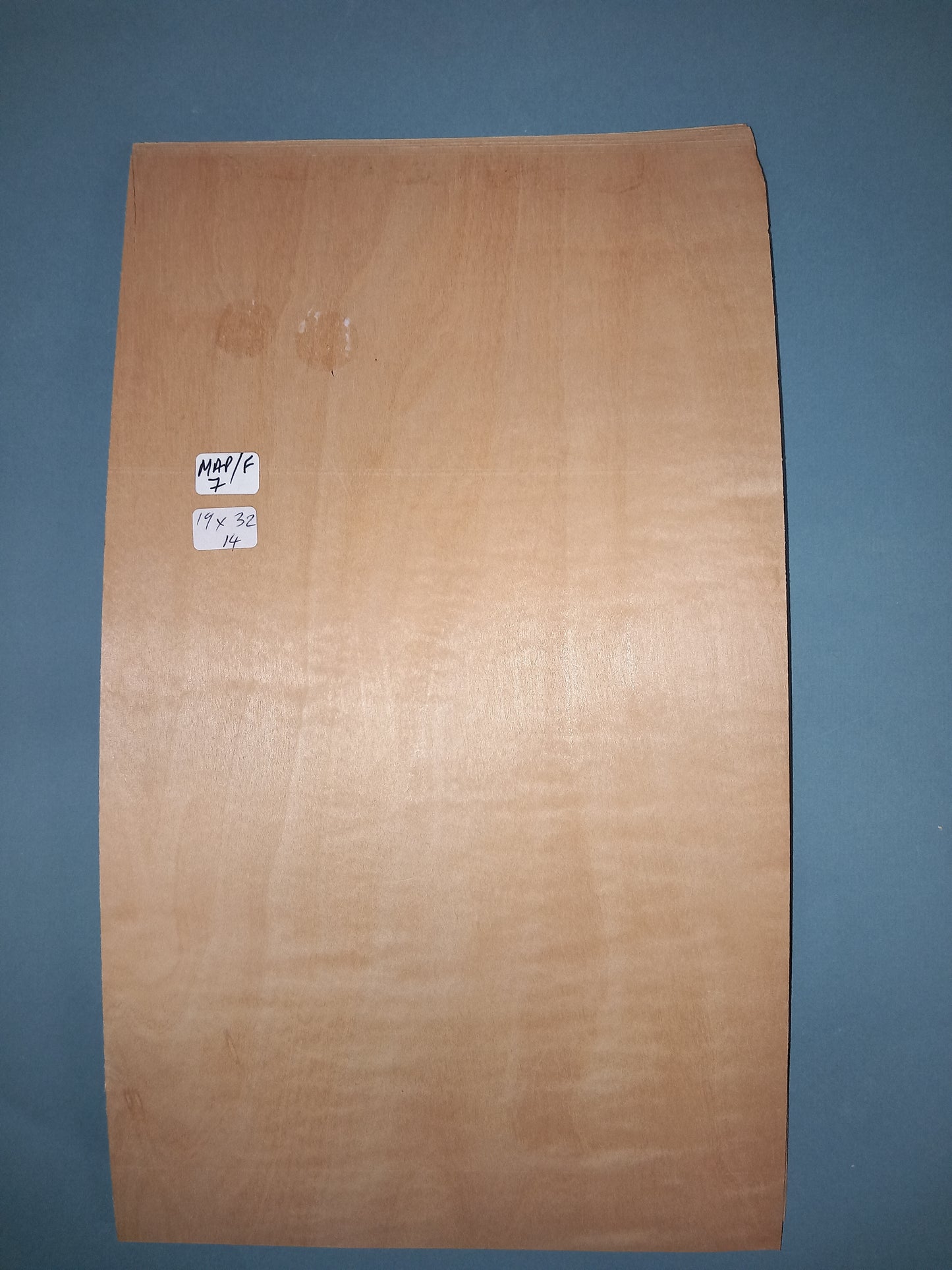 CONSECUTIVE SHEETS OF FIGURED MAPLE VENEER 19 X 32 CM