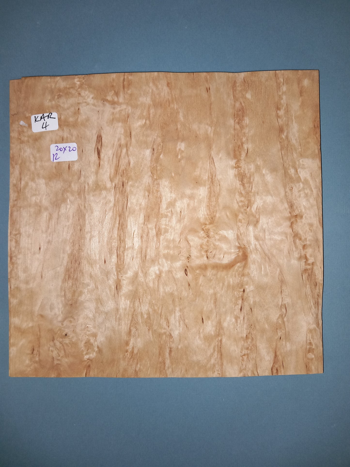 CONSECUTIIVE SHEETS OF KARELIAN BIRCH VENEER 20 X 20 CM