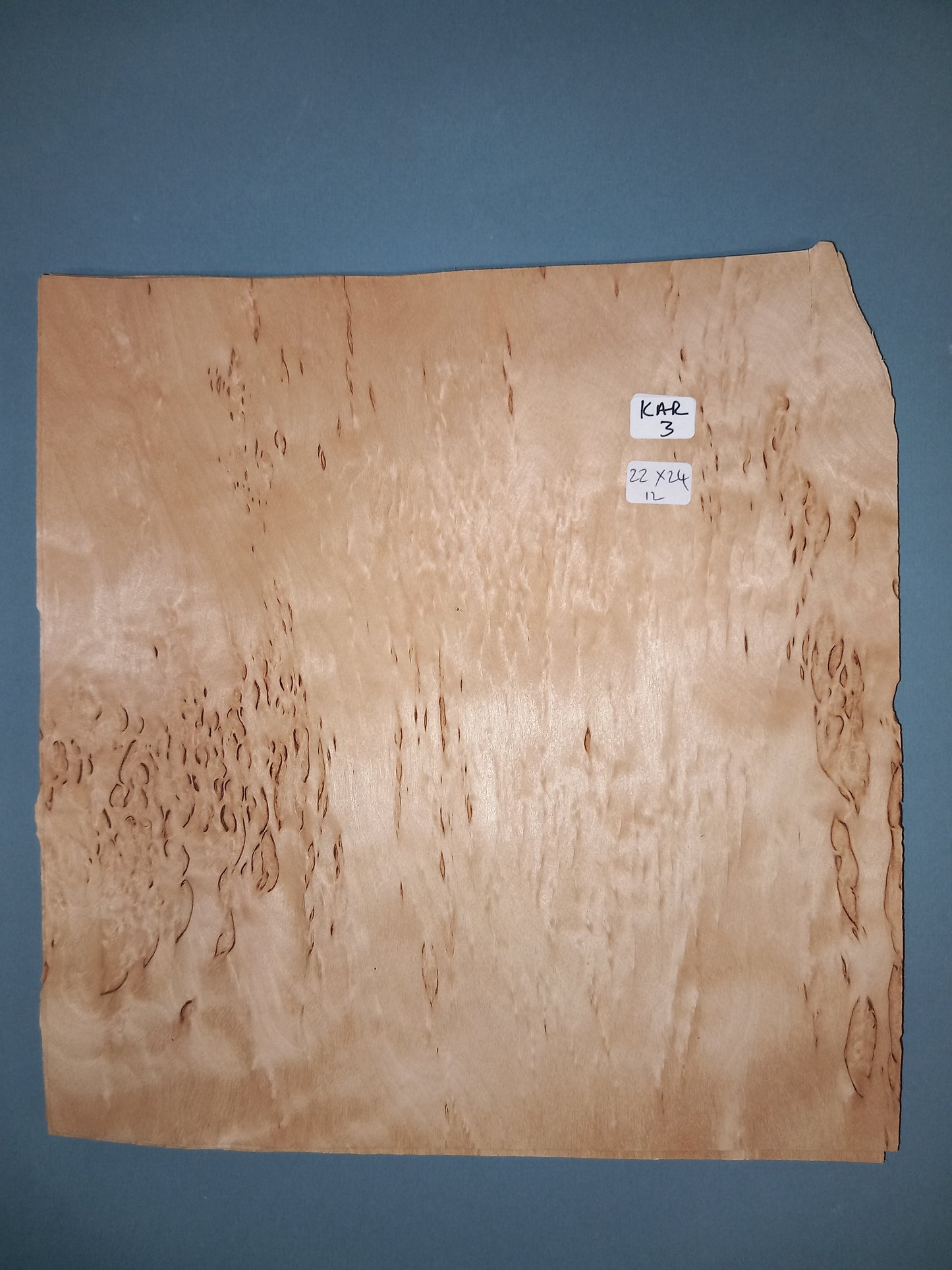 CONSECUTIVE SHEETS OF KARELIAN BIRCH VENEER 22 X 24 CM