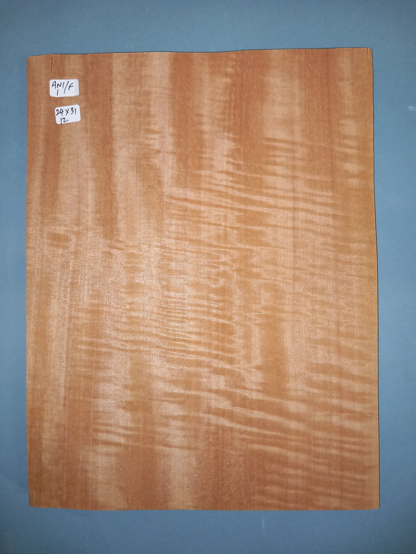 CONSECUTIVE SHEETS OF ANIGRE FIGURED VENEER 24 X 31 CM