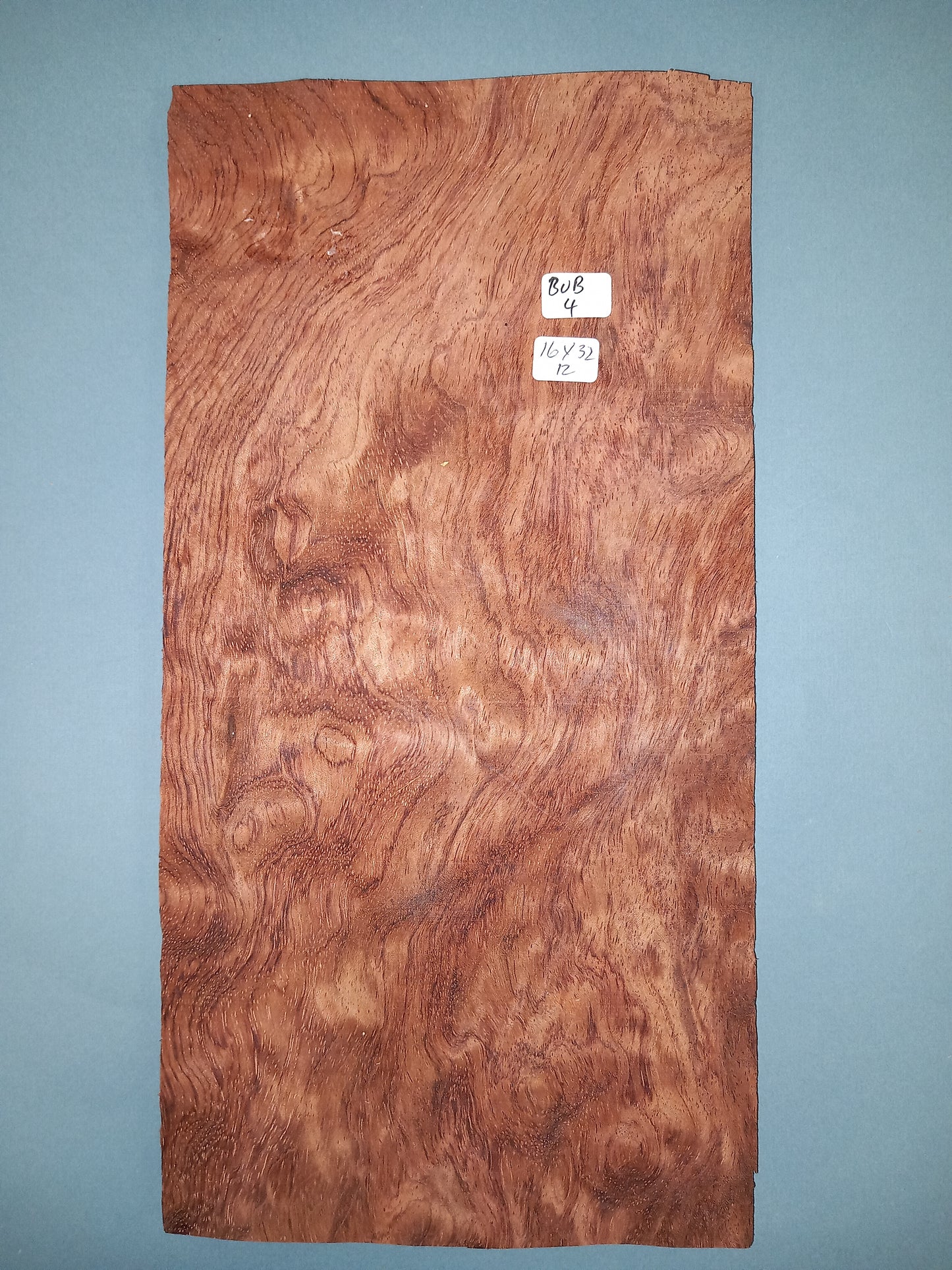 CONSECUTIVE SHEETS OF BUBINGA VENEER 16 X 32 CM