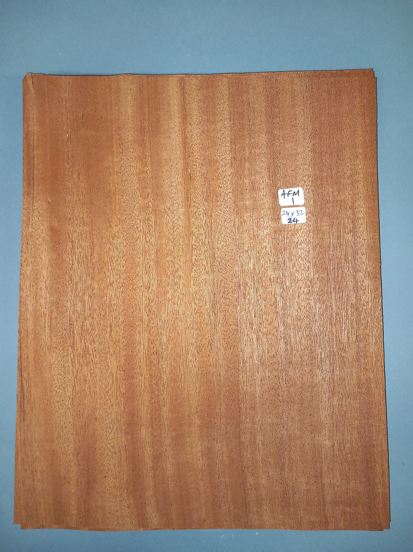 CONSECUTIVE SHEETS OF AFRICAN MAHOGANY VENEER 24 X 32 CM