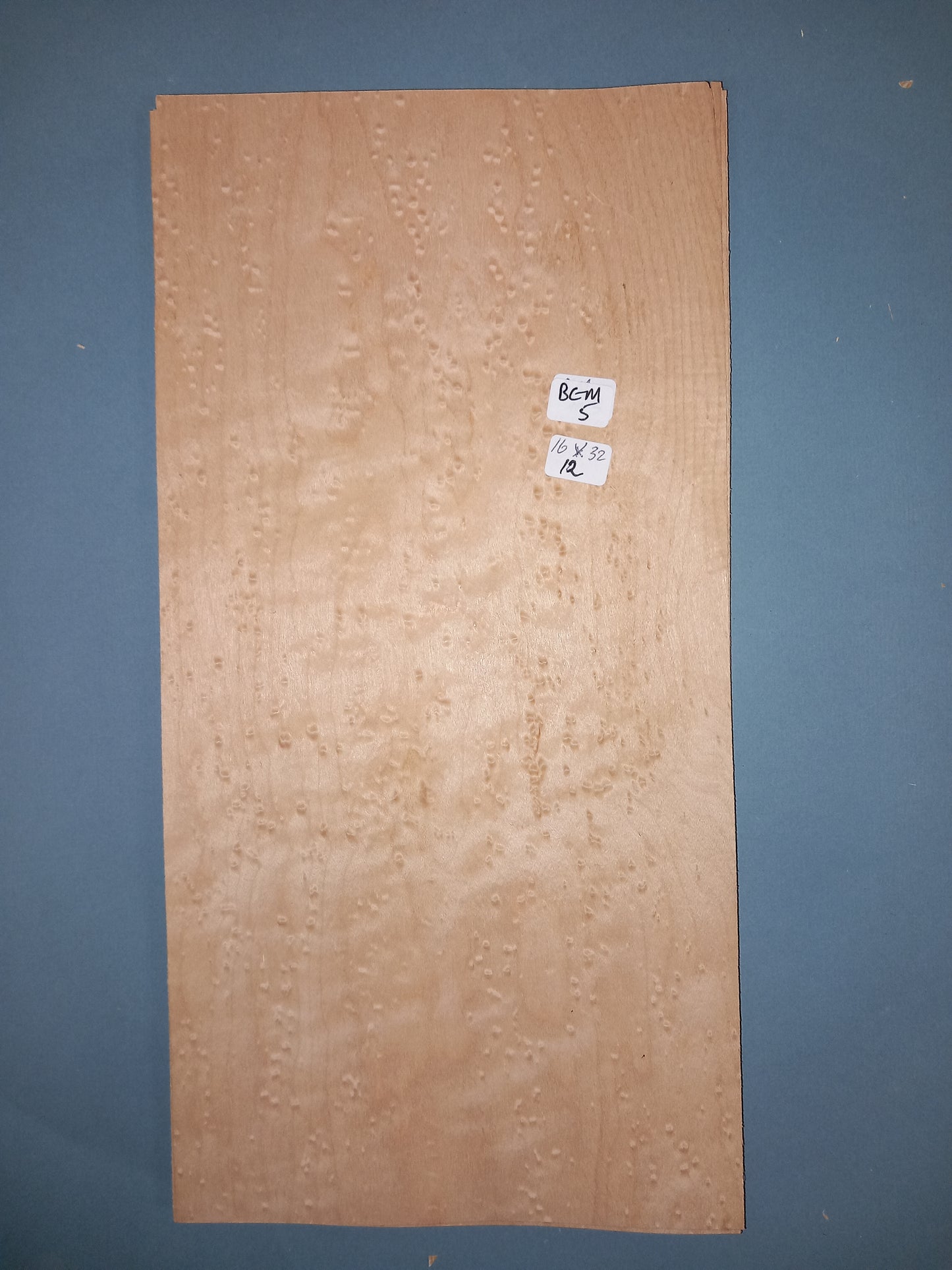 CONSECUTIVE SHEETS OF BIRDS EYE MAPLE VENEER 16 X 32 CM