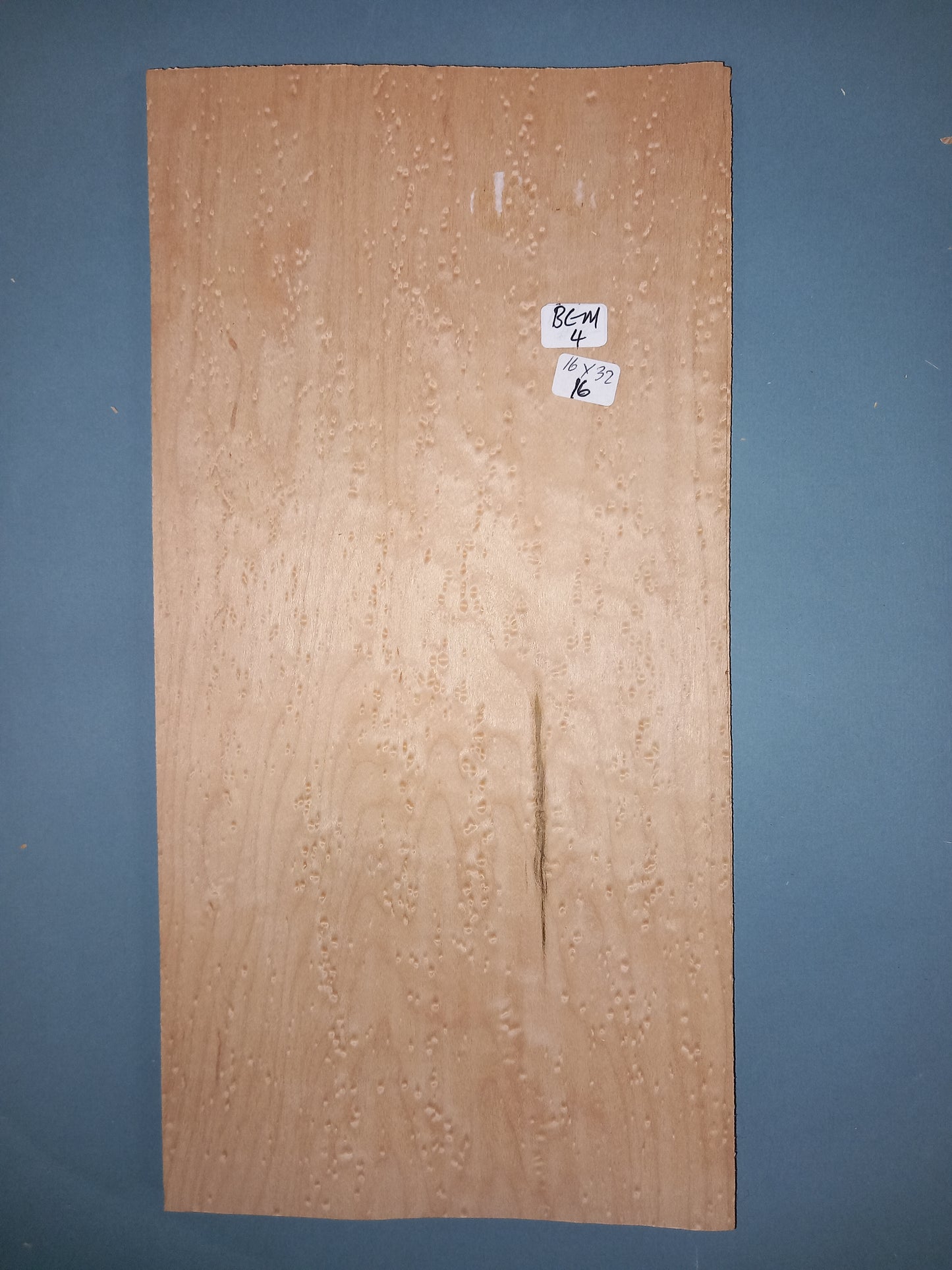 CONSECUTIVE SHEETS OF BIRDS EYE MAPLE VENEER 16 X 32 CM