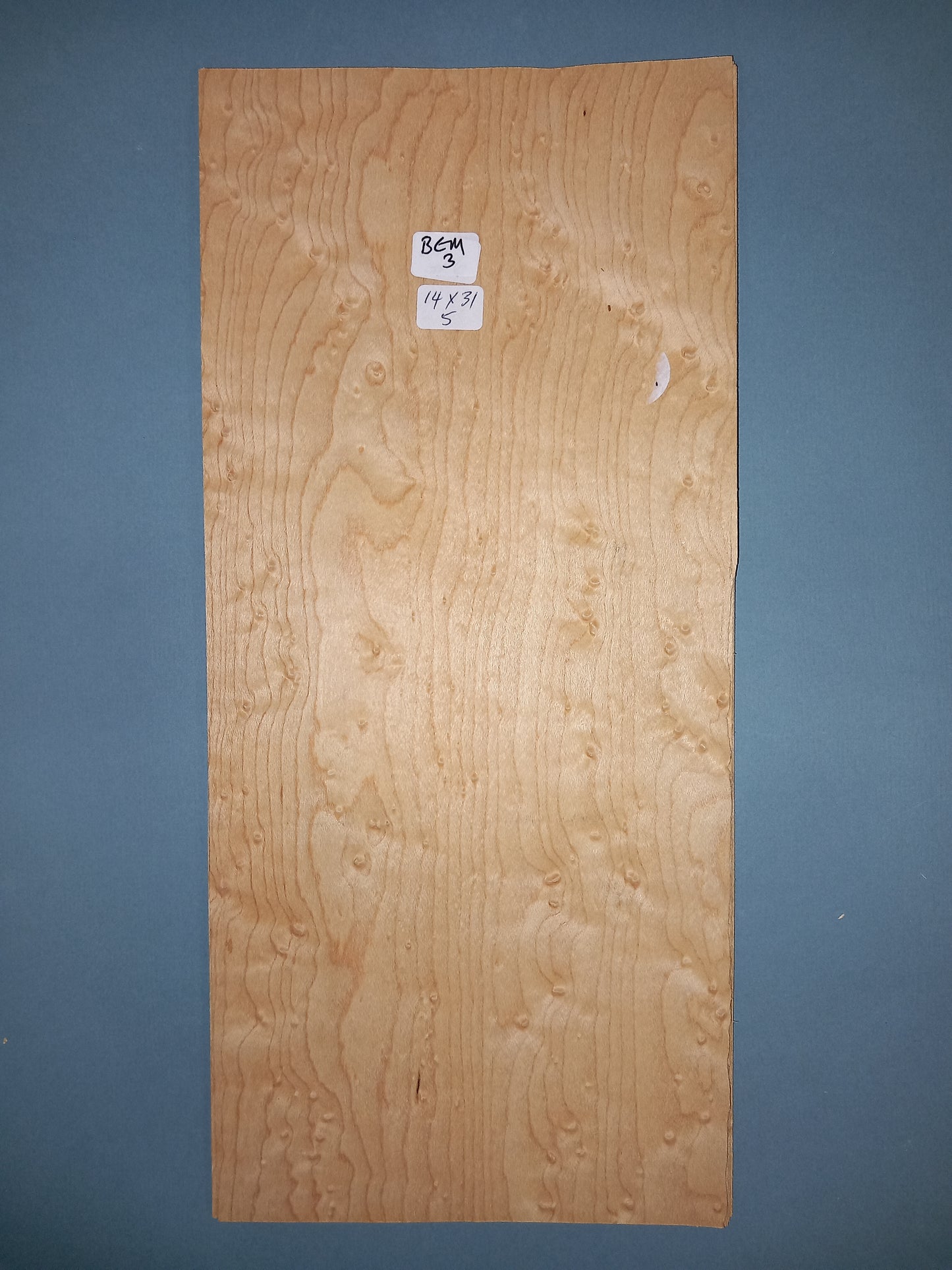CONSECUTIVE SHEETS OF BIRDS EYE MAPLE VENEER 14 X 31 CM
