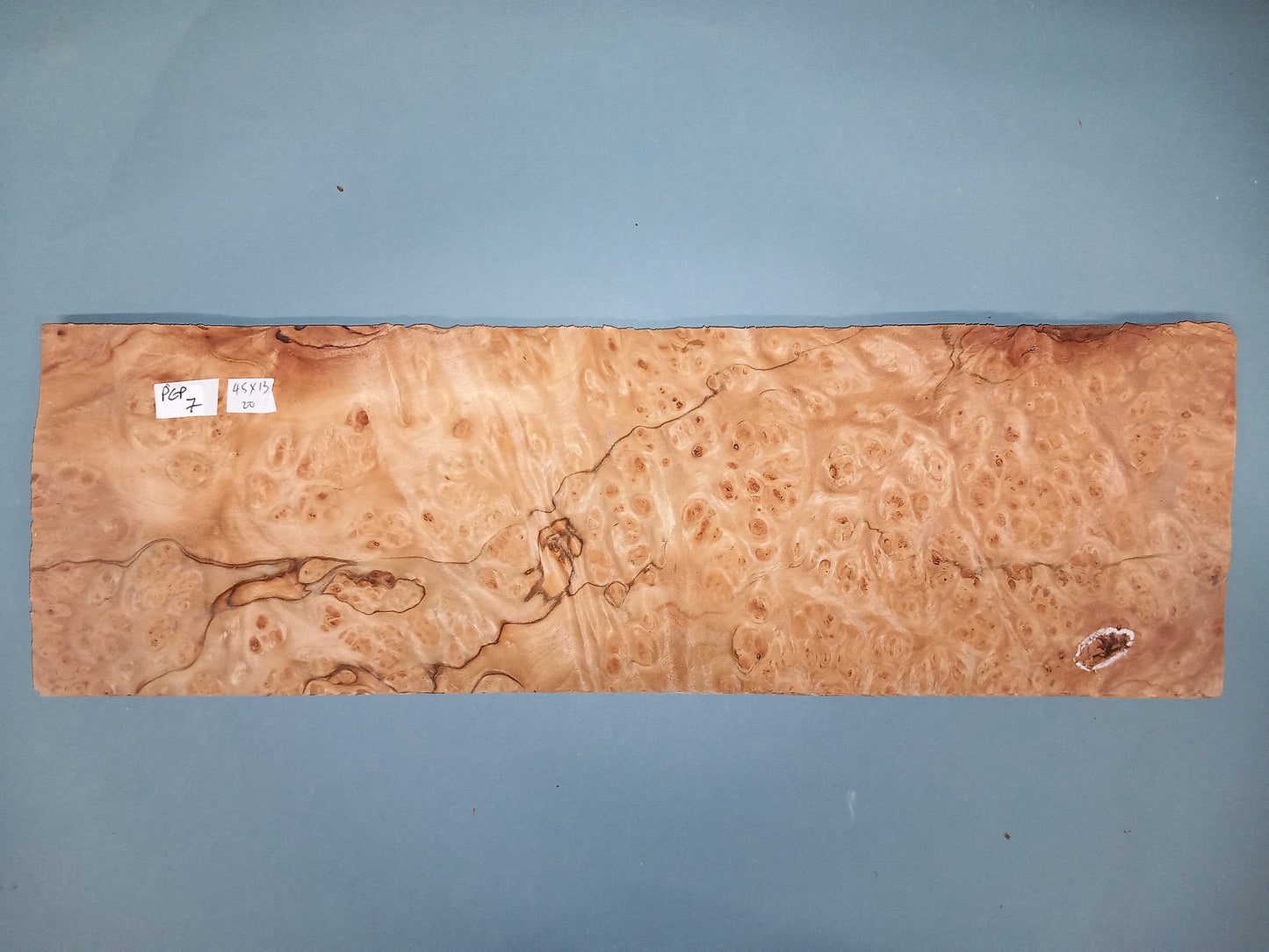 CONSECUTIVE SHEETS OF PEPPERWOOD BURR VENEER 45 X 13 CM