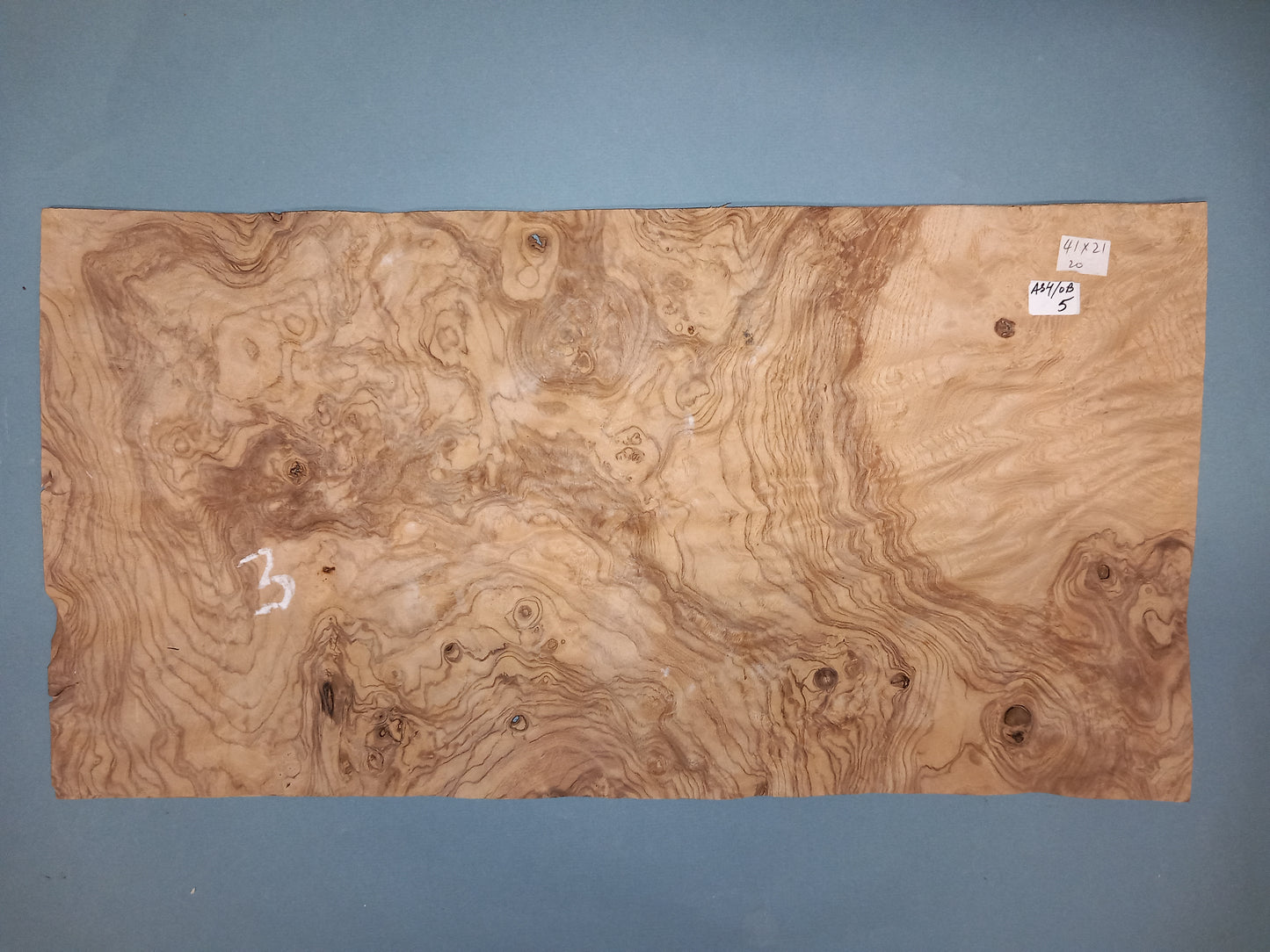 CONSECUTIVE SHEETS OF OLIVE ASH BURR VENEER 41 X 21 CM