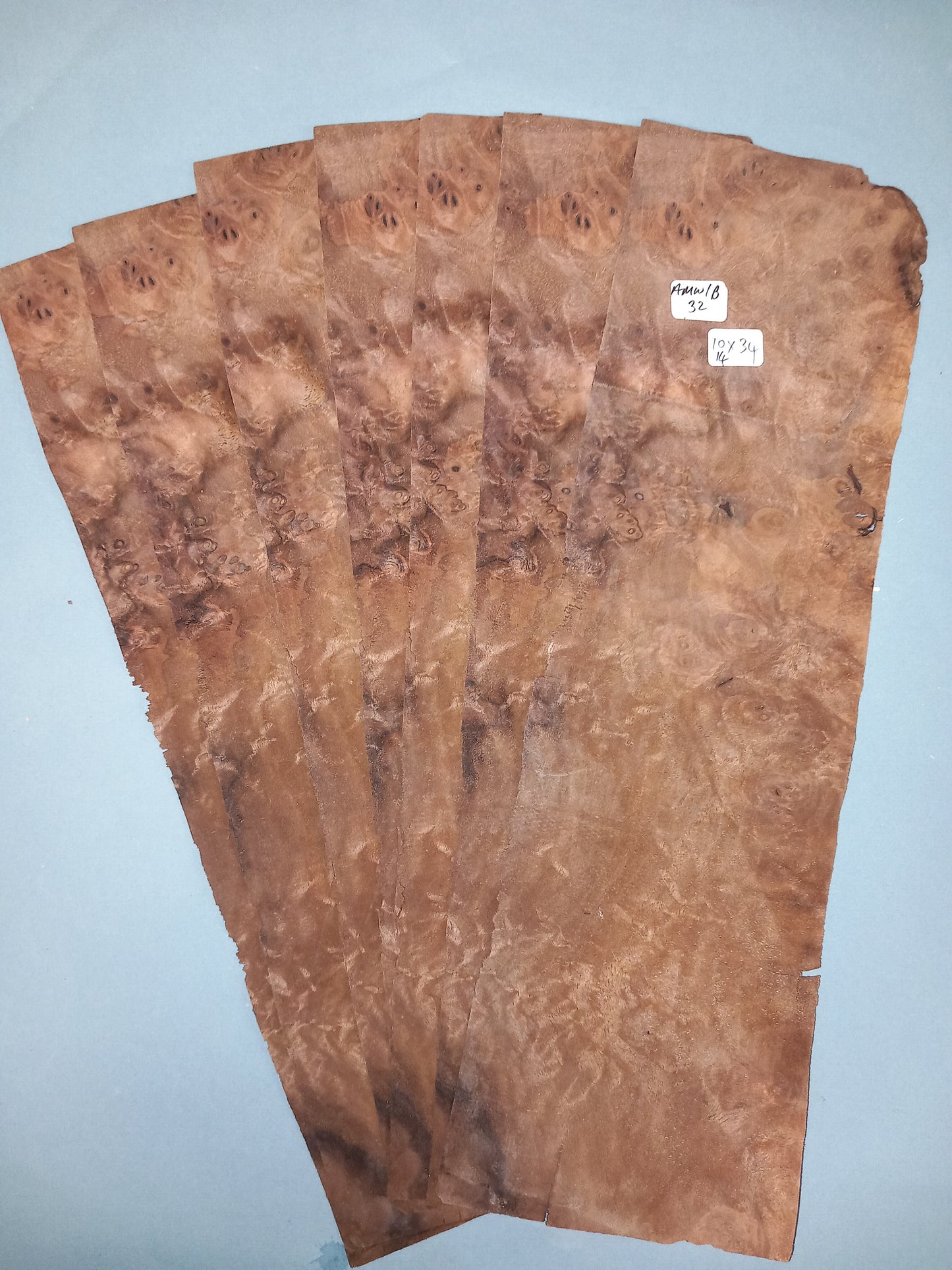 7 CONSECUTIVE SHEETS OF AMERICAN WALNUT BURR VENEER 10 X 34 CM