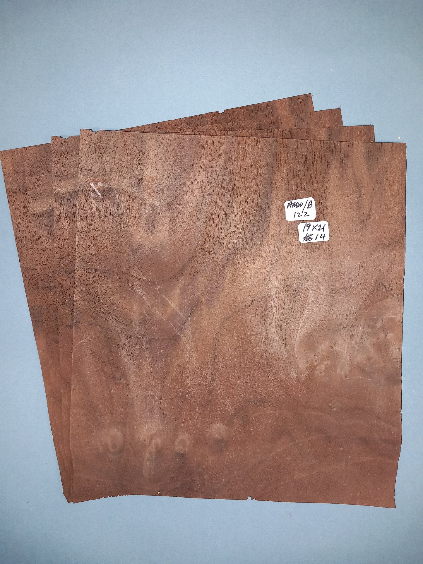 4 CONSECUTIVE SHEETS OF AMERICAN WALNUT BURR VENEER 19 X 21 CM