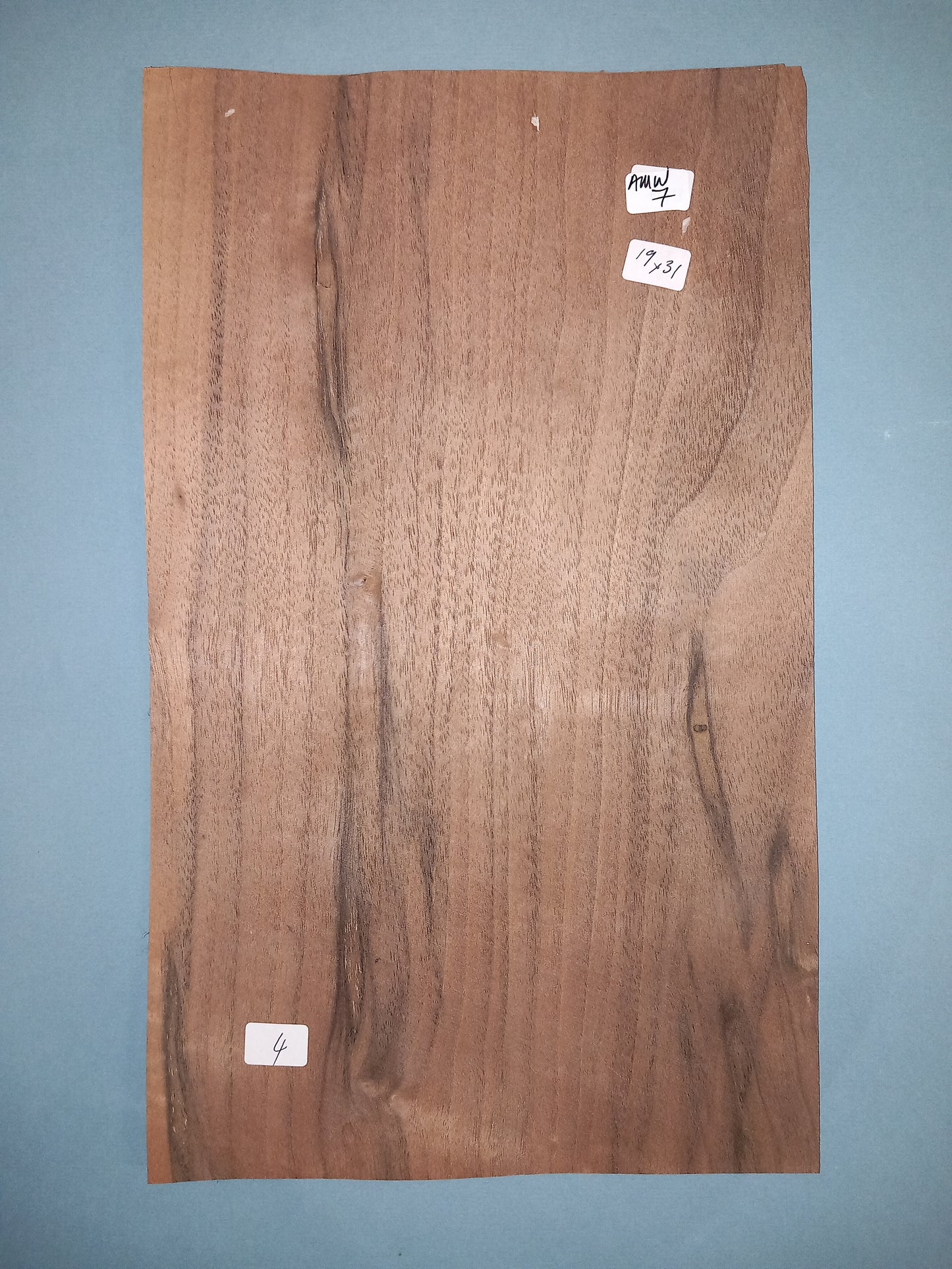 CONSECUTIVE SHEETS OF AMERICAN WALNUT VENEER 19 X 31 CM