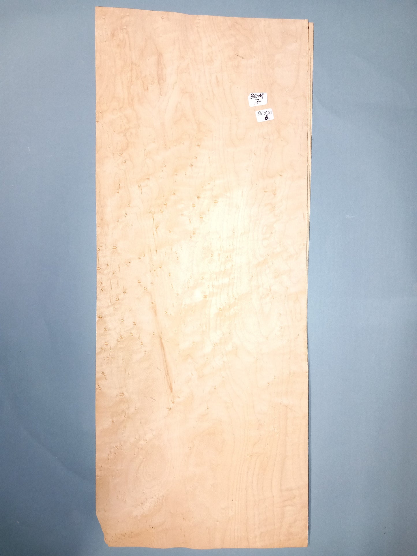 CONSECUTIVE SHEETS OF BIRDS EYE MAPLE VENEER 55 X 21 CM