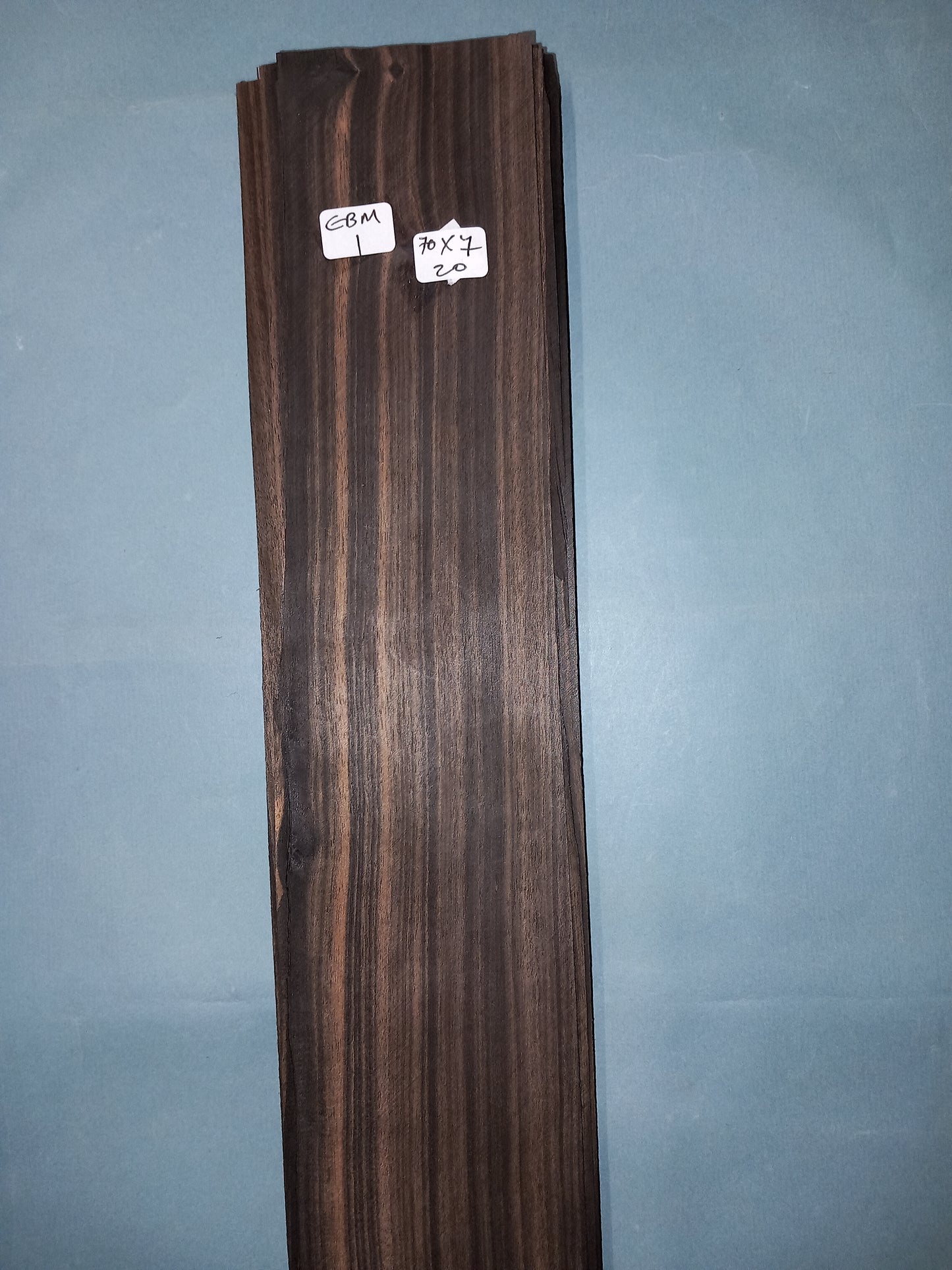 CONSECUTIVE SHEETS OF EBONY/MACASSAR VENEER 70 X 7 CM