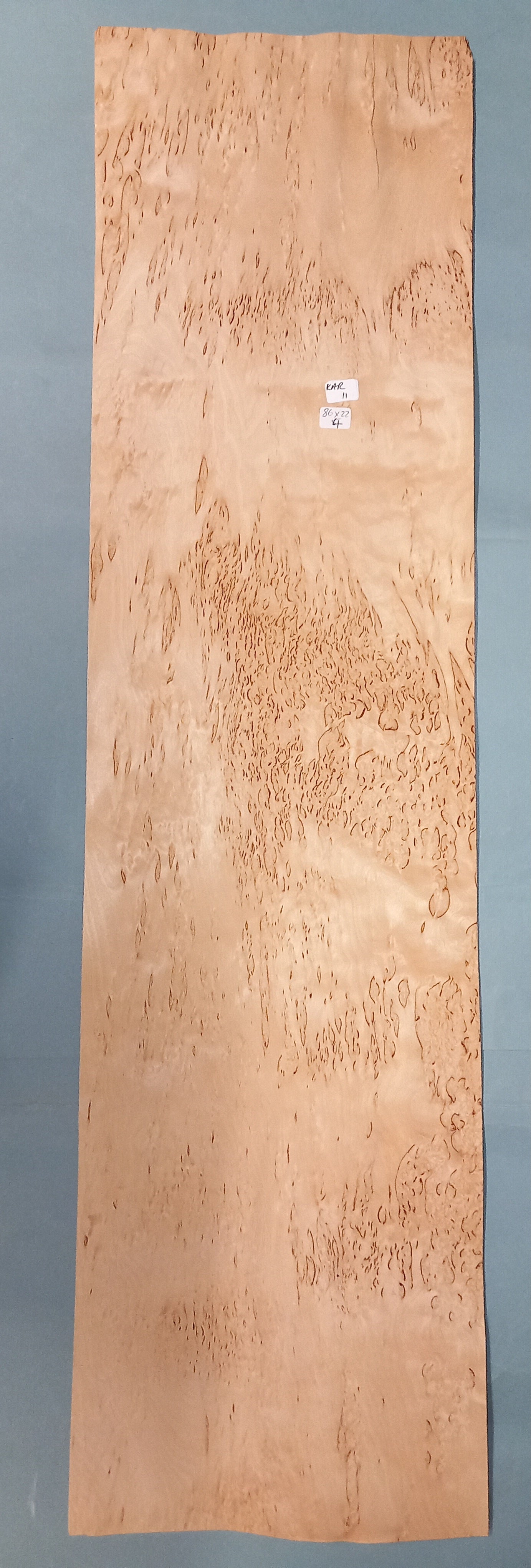 LARGE CONSECUTIVE SHEETS OF KARELIAN BIRCH VENEER 86 X 22 CM