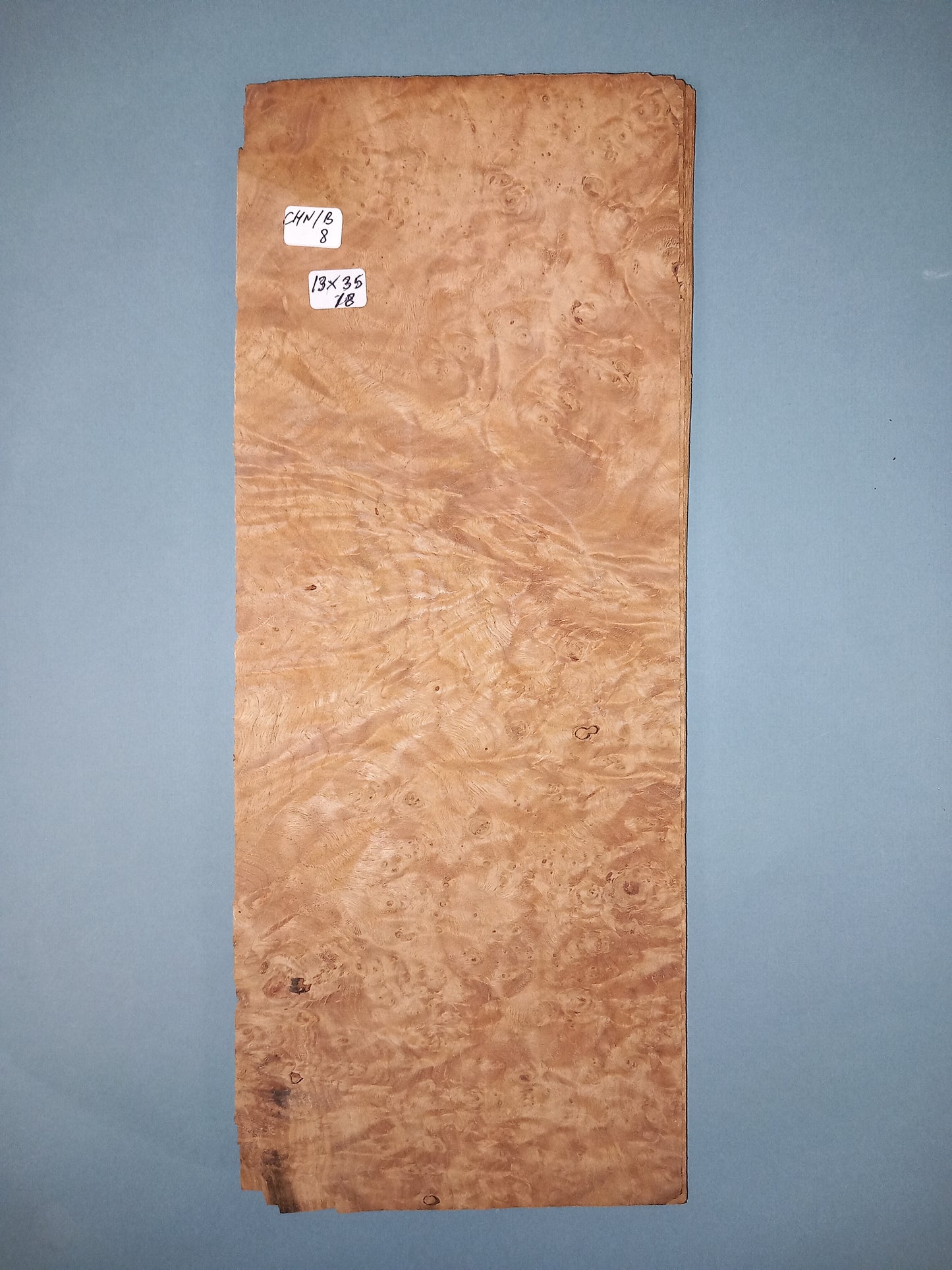 CONSECUTIVE SHEETS OF CHESTNUT BURR VENEER 13 X 35 CM