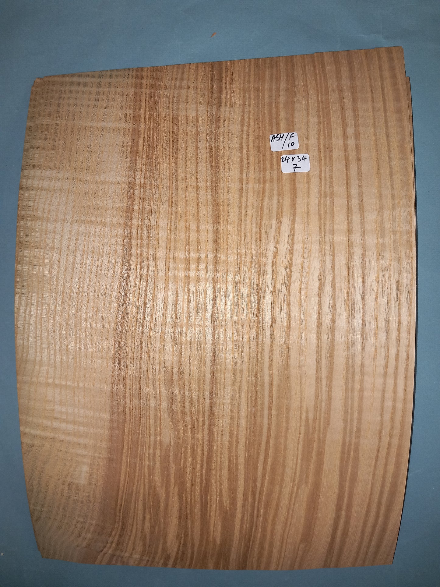 CONSECUTIVE SHEETS OF FIGURED OLIVE ASH VENEER 24 X 34 CM