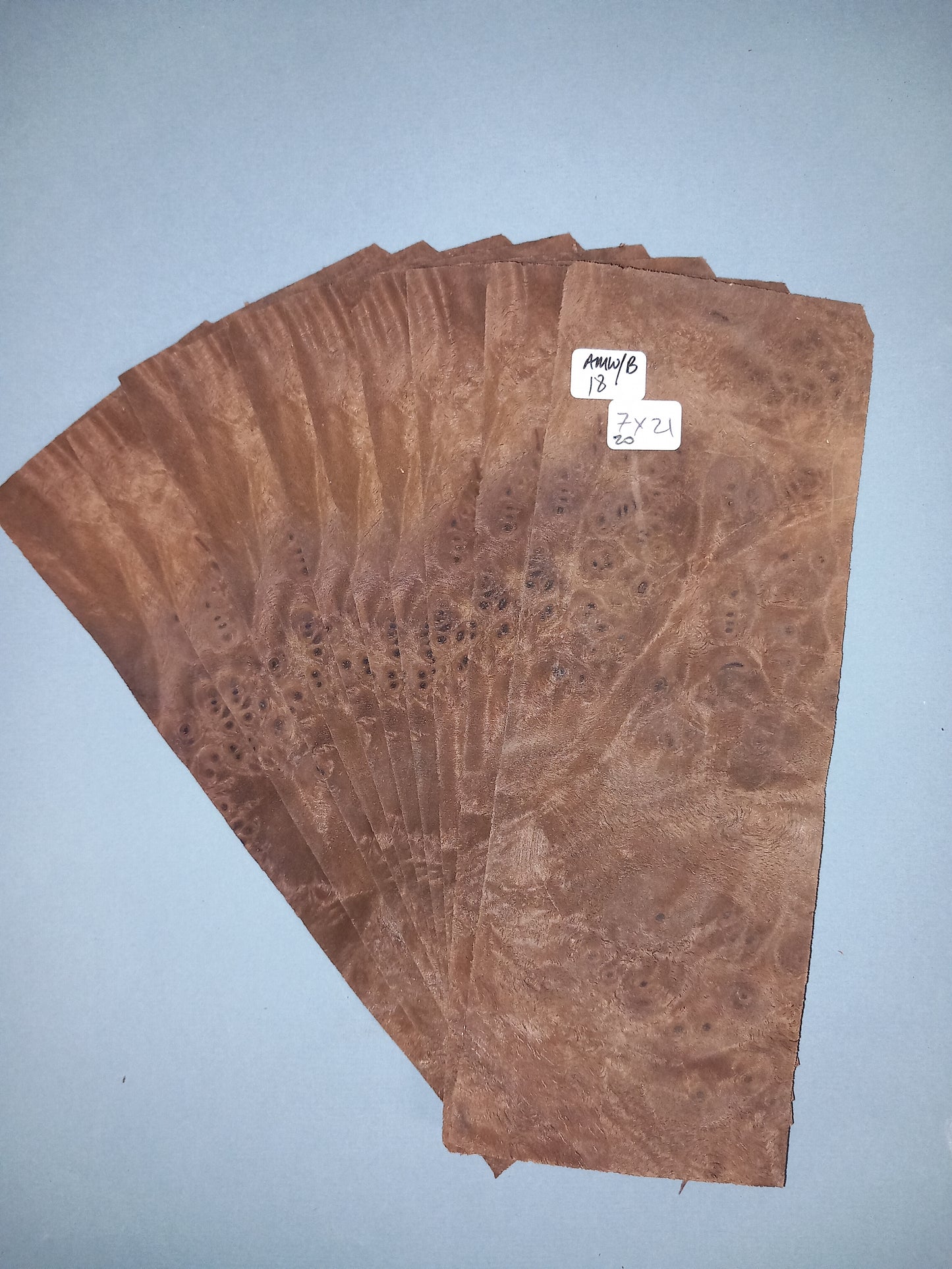 10 CONSECUTIVE SHEETS OF AMERICAN WALNUT BURR VENEER    7 X 21 CM