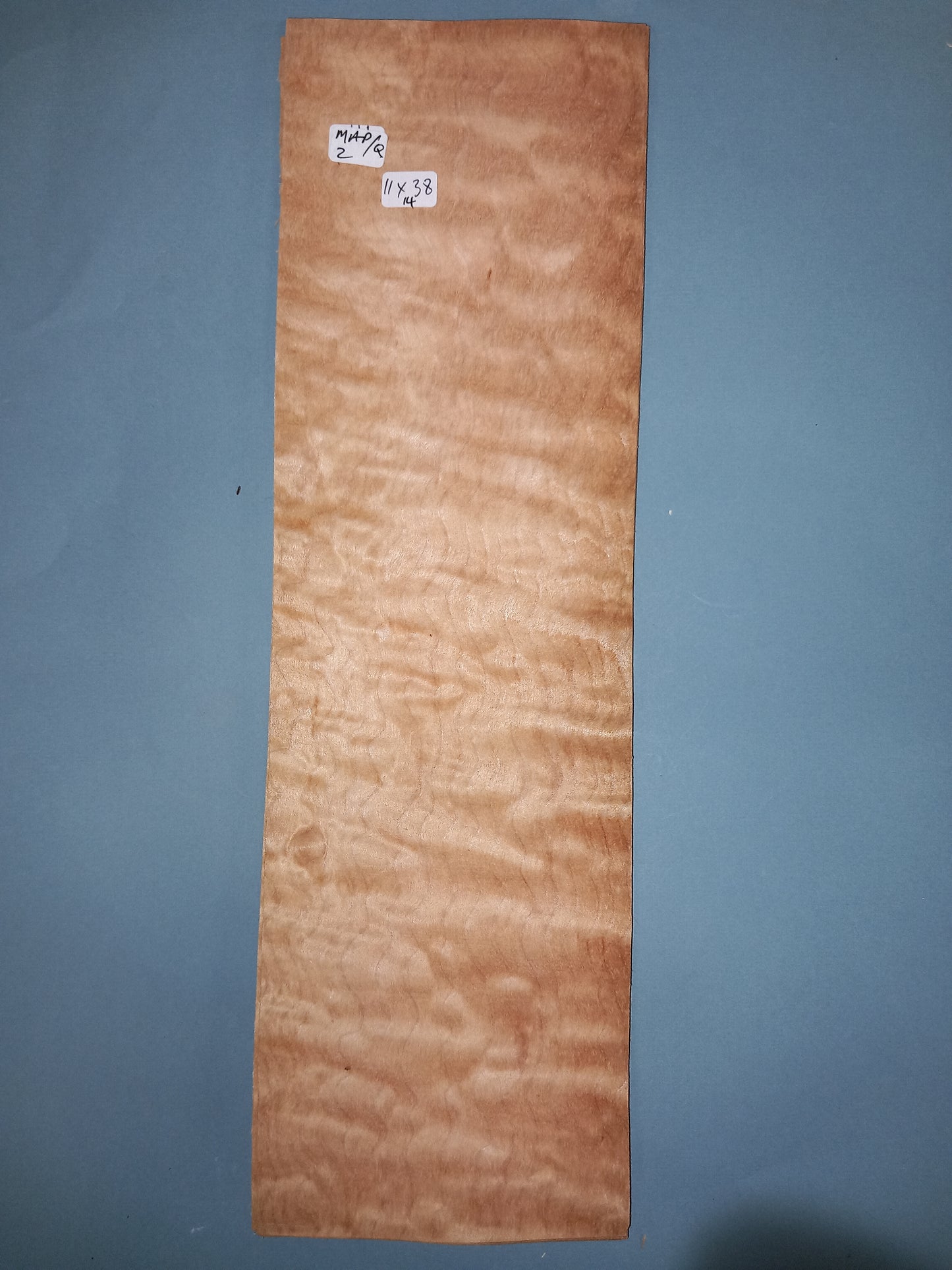 CONSECUTIVE SHEETS OF QUILTED MAPLE VENEER   11 X 38 CM