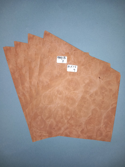 4 CONSECUTIVE SHEETS OF MADRONE BURR VENEER   14 X 15 CM