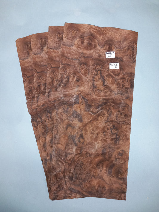 4 CONSECUTIVE SHEETS OF AMERICAN BURR WALNUT VENEER   14 X 32 CM