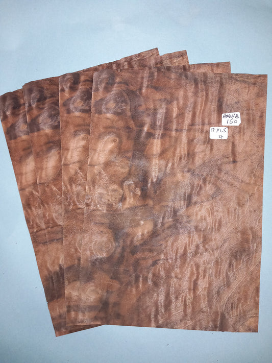 4 CONSECUTIVE SHEETS OF AMERICAN BURR WALNUT VENEER   17 X 25 CM